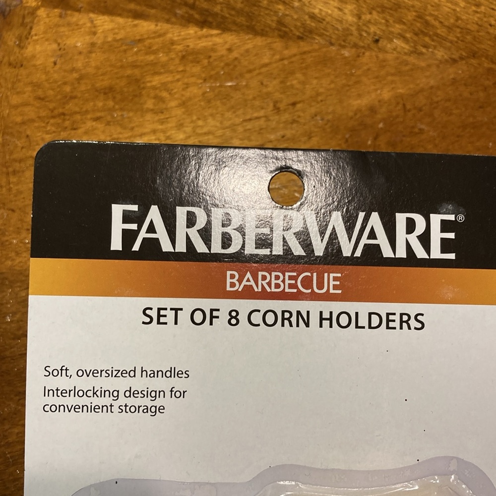 New in package Farberware barbecue set of 8 corn holders. - Picture 2 of 6